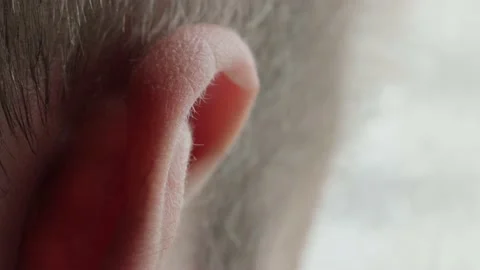 Human ear close-up. Listener concept, gossip and rumors, macro. Видео 156950591