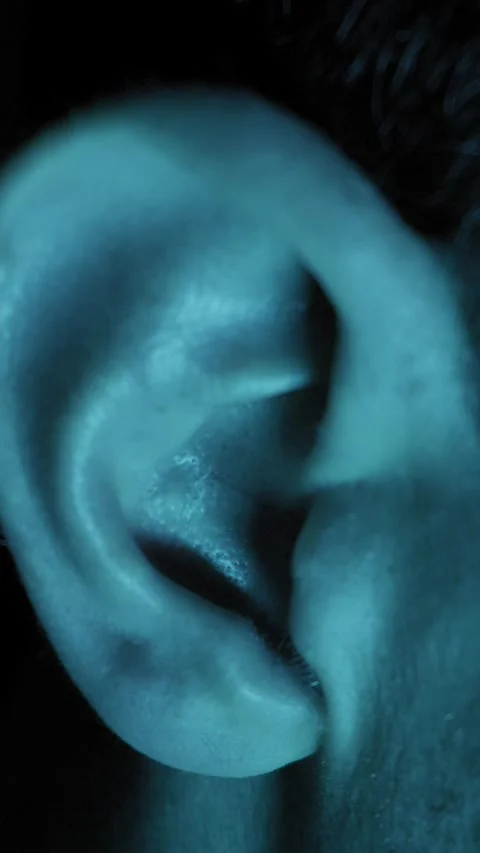 Human Ear Macro Close Up In Dramatic Blue Night Lighting Stock Footage 326170559