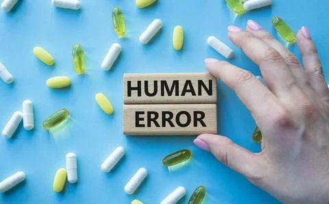 Human Error symbol. Concept word Human Error on wooden blocks. Beautiful bl.. Stockfoto's