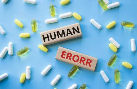 Human Error symbol. Concept word Human Error on wooden blocks. Beautiful bl.. Stockfoto's