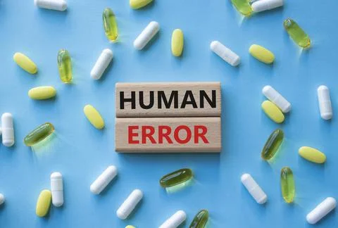 Human Error symbol. Concept word Human Error on wooden blocks. Beautiful blue Foto stock