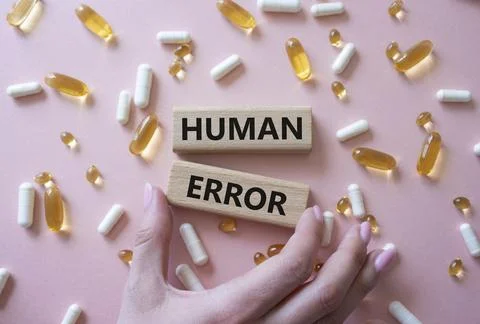 Human Error symbol. Concept word Human Error on wooden blocks. Beautiful pi.. 写真素材