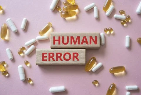 Human Error symbol. Concept word Human Error on wooden blocks. Beautiful pi.. Stockfoto's