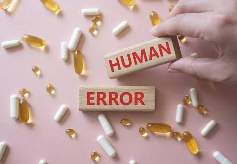 Human Error symbol. Concept word Human Error on wooden blocks. Beautiful pi.. Stockfoto's
