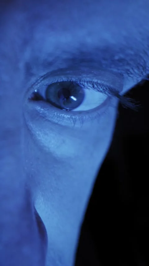 Human Eye Blinking And Looking Around In Mysterious Blue Light Stock Footage 330408006