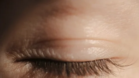 Human eye blinking, closeup Stock Footage 127107373