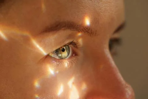 Human eye close up with prismatic light for vision concept Stock Photos