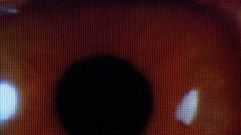 Human Eye on TV Screen Pixels Fluctuates with Color. RGB Monitor Pixels Effect. Video stock 129822184