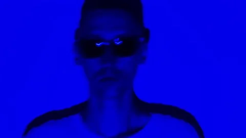 Human face in neon lights Stock Footage 208829356