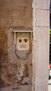 Human face shape doorbell Stock Photos