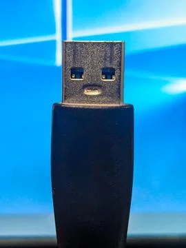 Human face on the usb flash drive on blue background Stock Photos