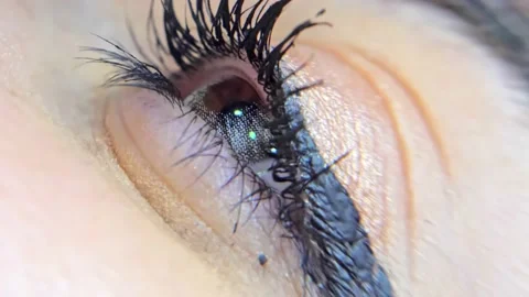 The human female eye opens and closes. macro Stock Footage 200824107