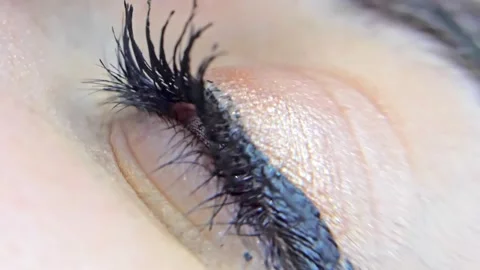 The human female eye opens and closes. macro Stock Footage 200824166