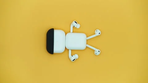 Human like figure made with wireless earphones jumping and saluting. Concept 스톡 동영상 153474591