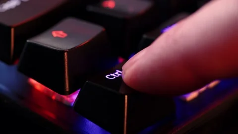 Human finger is clicking on the Ctrl button on the computer keyboard, close.. Stock Footage 234792785