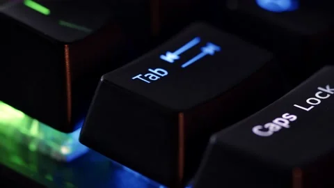 Human finger is clicking on the Tab button on the computer keyboard Stock Footage 234792766