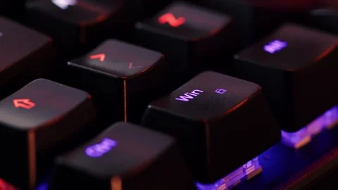 Human finger is clicking on the WIndows button on the computer keyboard, cl.. Stock Footage 265579408