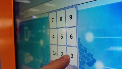 Human finger enters parcel code on screen and picks up parcel from automated Stock Footage 236166683