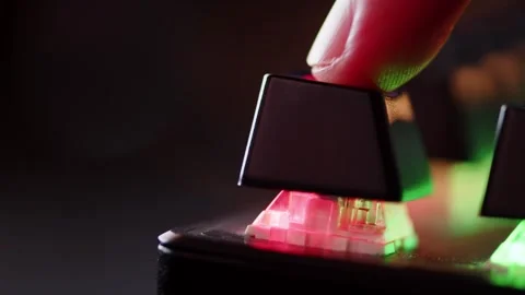 Human finger fast is clicking on the escape button on the computer keyboard.. Stock Footage 254623788