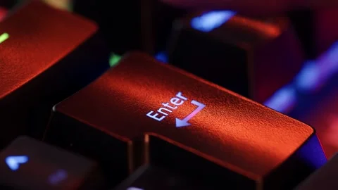 Human finger fast clicks on the Enter button on the computer keyboard, clos.. Stock Footage 234792883