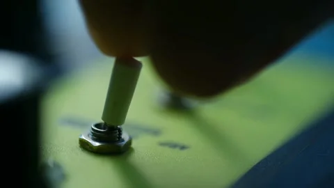 Human finger flipping a toggle switch on and off Stock Footage 337830898