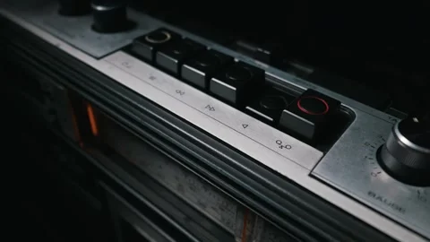 Human Finger Pressing the Play Button on a Vintage Silver Cassette Player Stock Footage 334110531