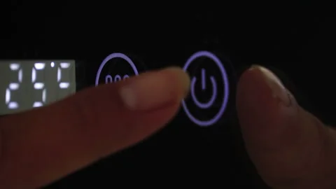 Human finger pressing on power button to turn on and off electrical equipment Stock Footage 287112452