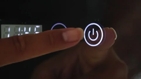 Human finger pressing on power button to turn on and off electrical equipment Stock Footage 287112483