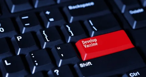 Human finger pushing text of develop vaccine 스톡 동영상 129093228