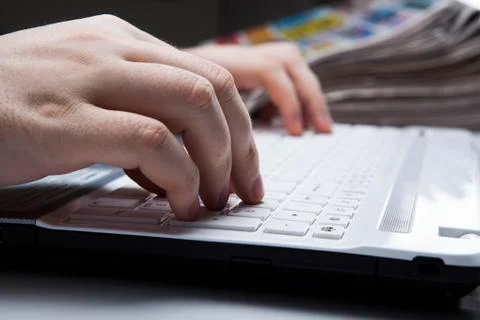 Human fingers on the keyboard Stock Photos