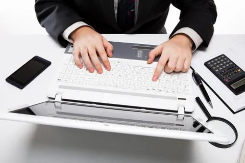 Human fingers on the notebook keyboard 库存照片