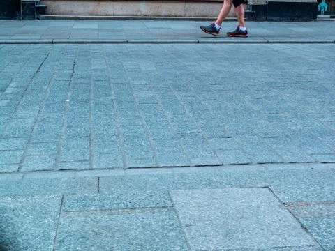 Human Foot in the steet of Cracow Stock Photos