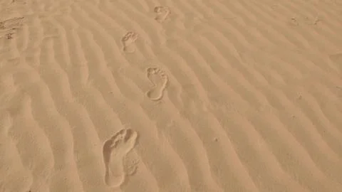 Human footprint on desert Stock Photos