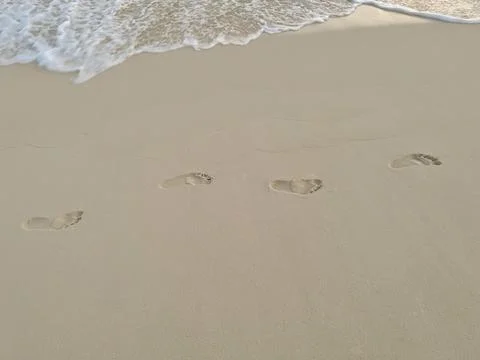 Human footprints on the sand Stock Photos