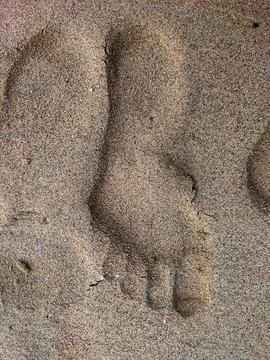Human footprints in the sand Stock Photos