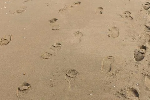 Human footprints on the sand Stock Photos