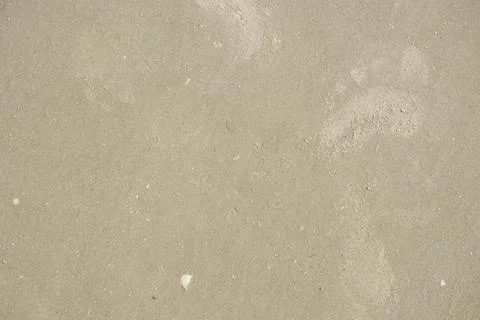 Human footprints in the sand. Texture background Footprints of human feet o.. 스톡 사진