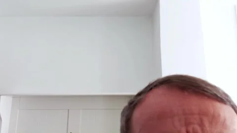 Human Forehead Detail in Indoor Setting with White Background Stock Footage 318443161