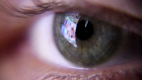 Human green eye looking at the screen of the smartphone. Stock-Footage 94181266