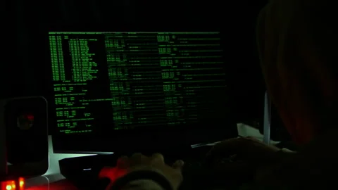 A human hacker is involved in breaking into security systems. Crack the password Vídeos de archivo 159107072