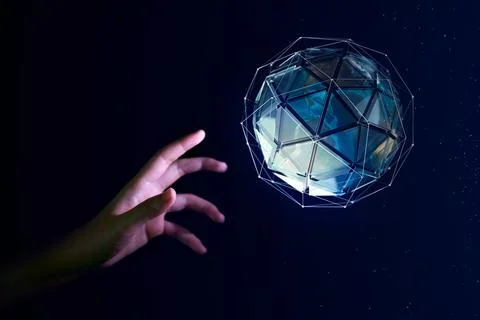 Human hand about to touch the earth globe, Earth Day concept Stock Photos
