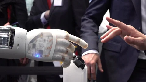 Human hand and robot's as a symbol of connection between people and artificial Stock Footage 105947818