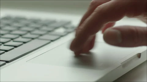 Human Hand and Touchpad and Keyboard of Laptop Stock Footage 60384506