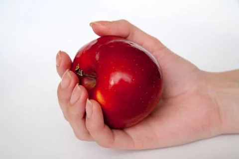 Human hand with apple isolate on whit background Stock Photos