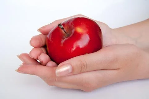 Human hand with apple isolate on whit background Stock Photos