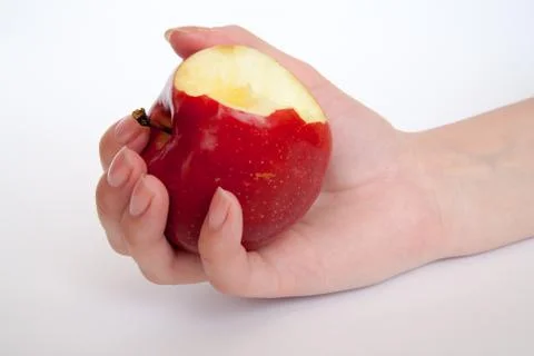 Human hand with apple isolate on whit background Stock Photos