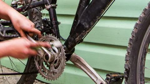 Human Hand Cleaning Bicycle Chainring With Brush Stock-Footage 52528488