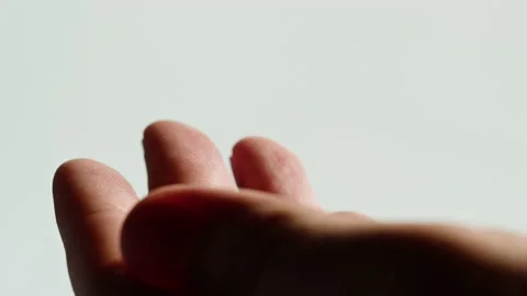 Human hand close-up, skin texture, Palm reading, foretelling the future through Stock Footage 226232601