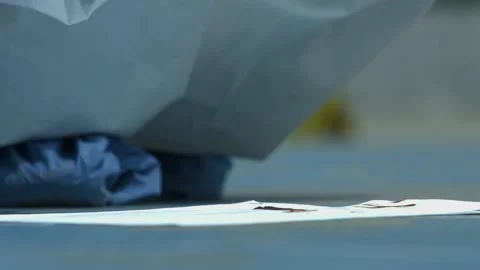 Human hand collecting blood samples at the crime scene with a cotton swab and Stock Footage 144508337