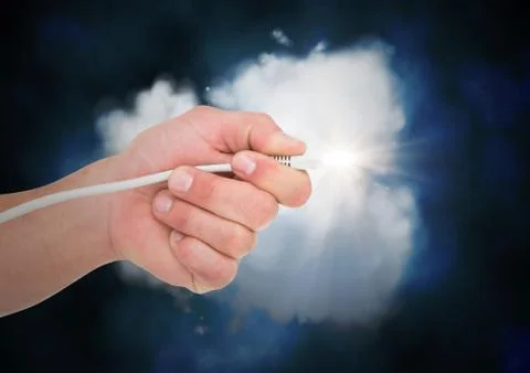 Human hand connecting cable to the cloud Foto stock